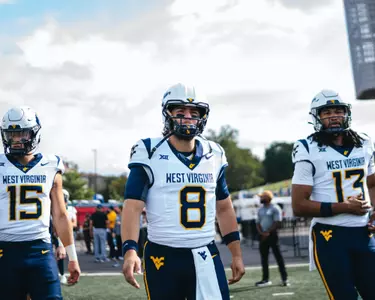 West Virginia faces the Kansas Jayhawks to begin Big 12 Conference play in Lawrence, Kansas, on Sept. 20, 2025.