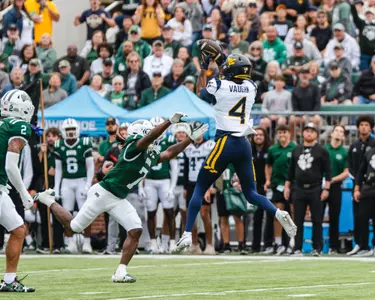 West Virginia battles Ohio in the first half at Peden Stadium in Athens, Ohio, on Sept. 6, 2025.