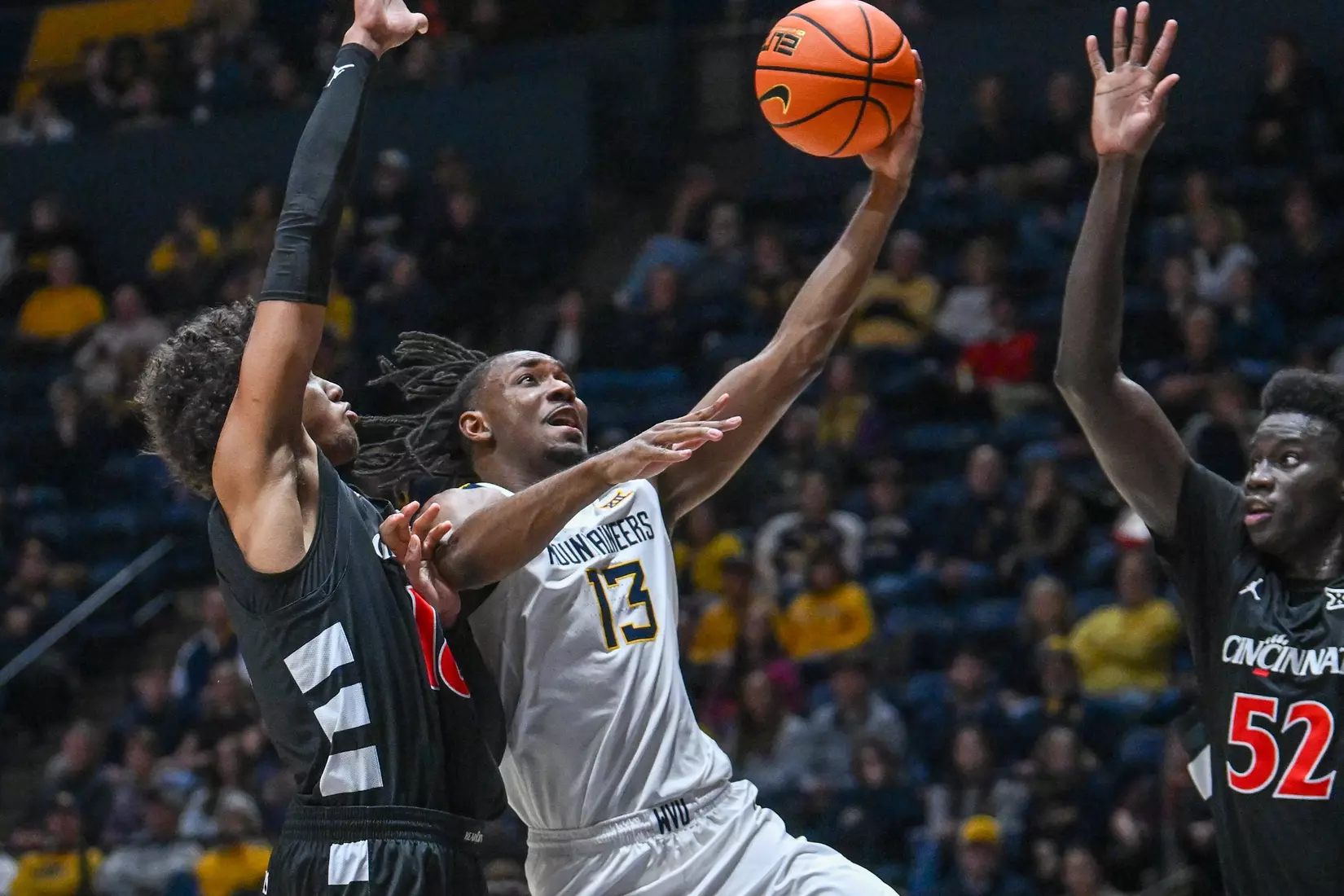 West Virginia battles Cincinnati in its Big 12 Conference home opener at Hope Coliseum on Jan. 6, 2026.