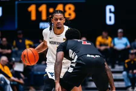 West Virginia battles Cincinnati in its Big 12 Conference home opener at Hope Coliseum on Jan. 6, 2026.