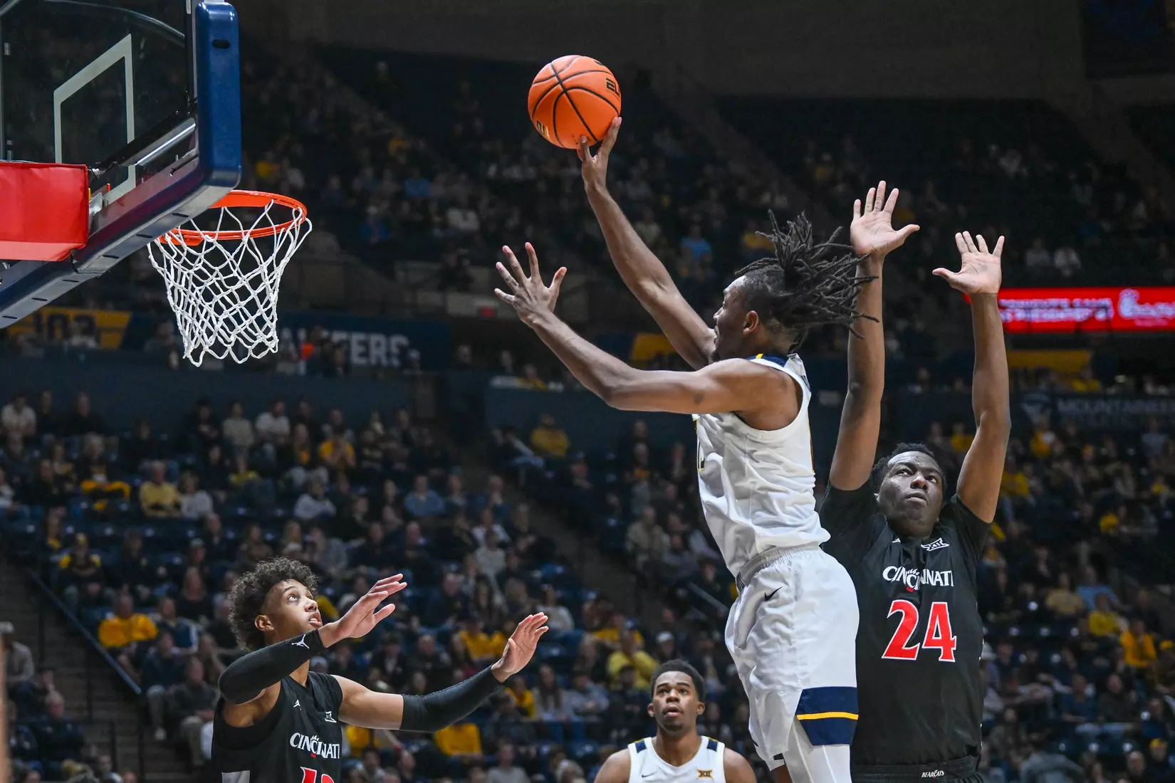 West Virginia battles Cincinnati in its Big 12 Conference home opener at Hope Coliseum on Jan. 6, 2026.