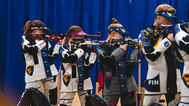 Ashlyn Blake and members of the wvu rifle team on the line against Mount A