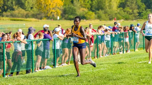 Tecla Lokrale runs during the John McNichols Invitational