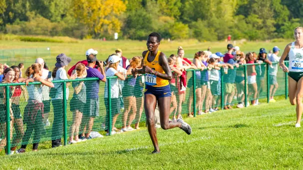Tecla Lokrale runs during the John McNichols Invitational