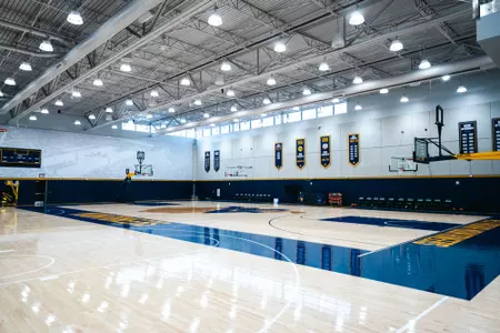One of the practice courts inside the WVU Basketball Practice Facility at the Hope Coliseum Complex.