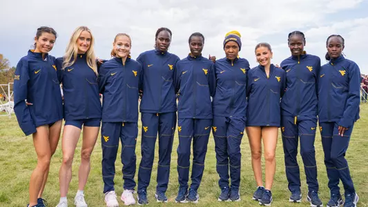 WVU Cross Country Team poses following the win at the Nuttycombe Invitational