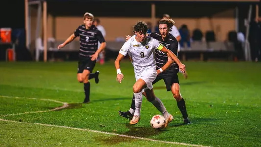 Pablo Pozos battles for the ball against South Carolina
