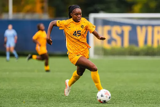 Tyler Clyburn passes the ball during a game at Dick Dlesk Soccer Stadium.