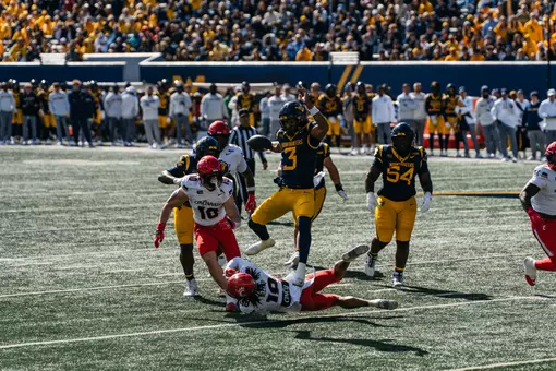 Quarterback Michael Hawkins Jr. (3) scores the rushing touchdown against Cincinnati in the first half at Milan Puskar Stadium on Oct. 17, 2026.