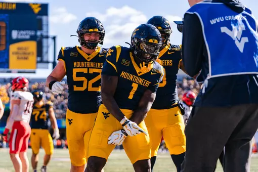 Running back Amari Latimer (1) scores a rushing touchdown in the fourth quarter against Cincinnati at Milan Puskar Stadium on Oct. 17, 2026.
