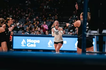 Reagan Turk celebrates after a point against Cincinnati on Oct. 16