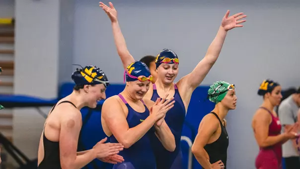 The West Virginia University women’s swimming team opened the 2026-27 campaign with a dominating, 214-61, victory over the Marshall Thundering Herd at The Peak Health Aquatic Center at Mylan Park on Friday.