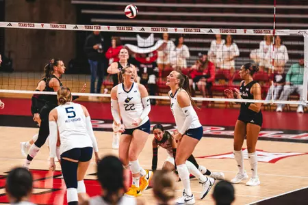 Anna Barr celebrates after winning a point against Texas Tech on Oct. 2