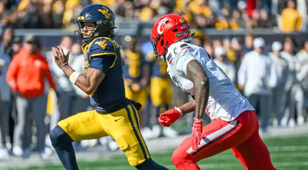 Quarterback Michael Hawkins Jr. (3) races toward the endzone against Cincinnati at Milan Puskar Stadium on Oct. 17, 2026.