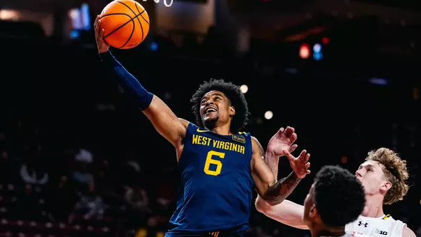 Martin Somerville drives for a layup during West Virginia's exhibition game played against Maryland in College Park on Sunday, October 18, 2026.