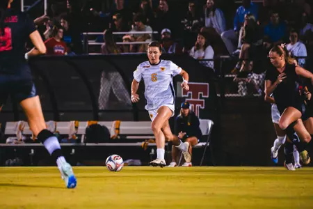 Maya Leoni dribbles a ball down the field at John Walker Soccer Complex in Lubbock, Texas.