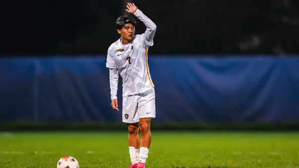 Kanta Ishii prepares to take a free kick