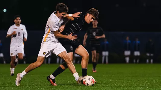 Isaac Scheer battles for the ball against South Carolina
