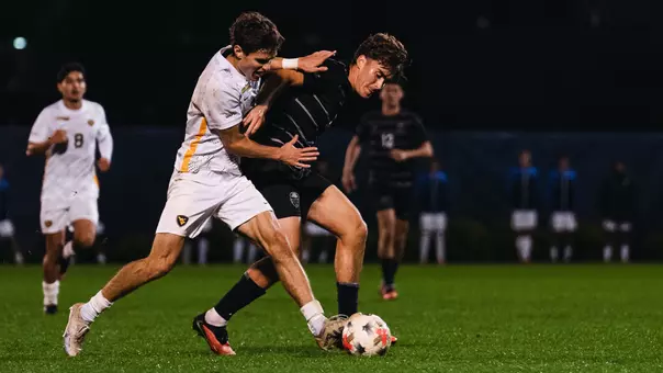 Isaac Scheer battles for the ball against South Carolina