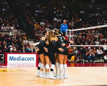 WVU Volleyball huddles before a point versus Iowa State