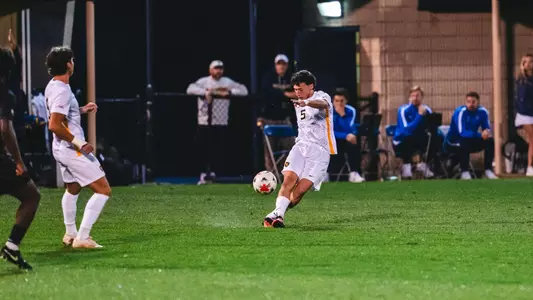 Nacho Martinez kicks the ball against South Carolina