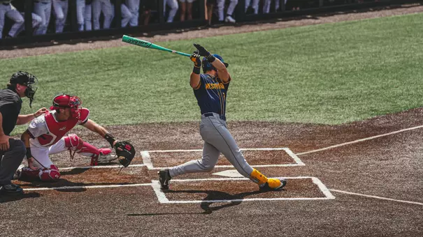 Maxwell Molessa swings and hits a go-ahead two-run single in the 13th inning against Cincinnati