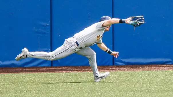Centerfielder Paul Schoenfeld extends to make a great diving catch in West Virginia's 4-1 victory over ninth-ranked Kansas at Hoglund Ballpark in Lawrence, Kansas, on Friday, May 8, 2026.