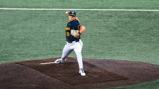 Ian Korn throws a pitch against TCU
