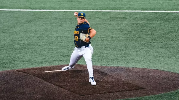 Ian Korn throws a pitch against TCU