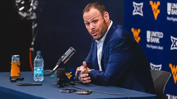 WVU Vice President and Director of Athletics Wren Baker visits with media in the Team Room inside the Milan Puskar Center on Tuesday, May 19, 2026.