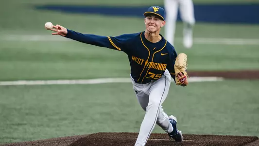 Chansen Cole throws a pitch against the Kansas State Wildcats