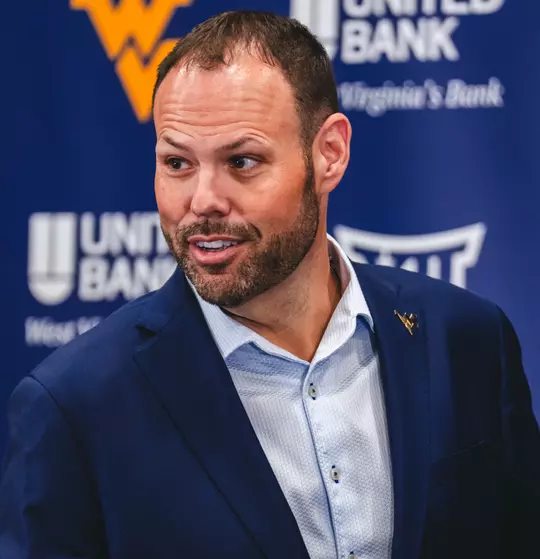 WVU vice president and director of athletics Wren Baker visits with media in the team room at Milan Puskar Stadium on Tuesday, May 19, 2026.