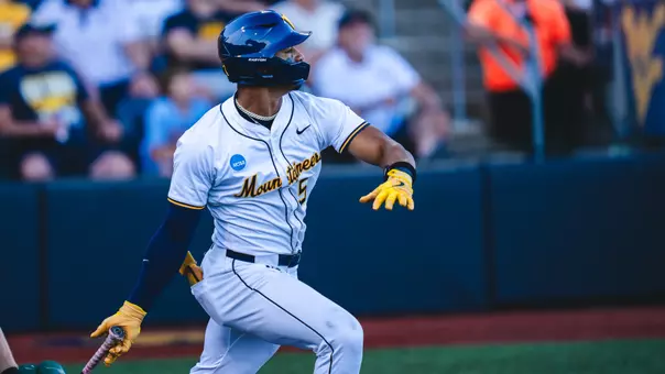 Armani Guzman swings the bat against Binghamton in the NCAA Regional