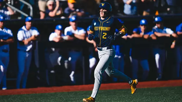 Gavin Kelly rounds the bases after hitting a home run against Kentucky.