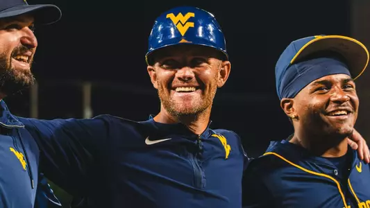 West Virginia University baseball coach Steve Sabins celebrates his team's 7-2 victory over Marshall at GoMart Ballpark in Charleston, W.Va., on Tuesday, May 5, 2026.