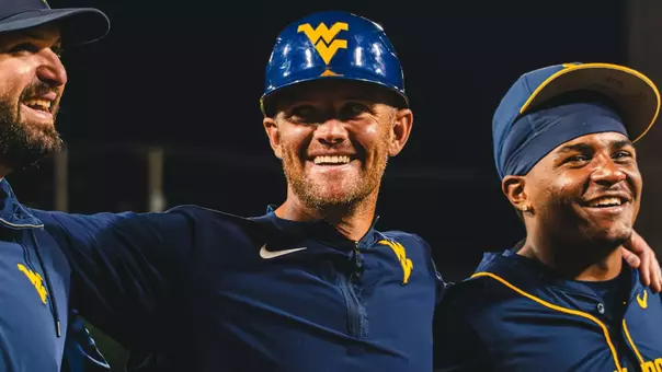 West Virginia University baseball coach Steve Sabins celebrates his team's 7-2 victory over Marshall at GoMart Ballpark in Charleston, W.Va., on Tuesday, May 5, 2026.