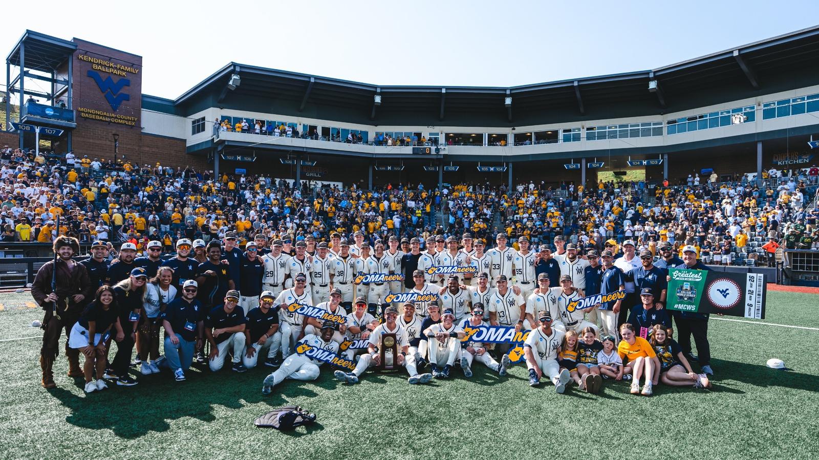 The West Virginia Baseball team poses for a photo after winning the NCAA Morgantown Super Regional