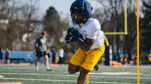 West Virginia running back Cam Cook does a drill during spring football practice at the Steve Antoline Family Practice Facility in March, 2026.