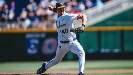 Carson Estridge throws a pitch against North Carolina in the College World Series