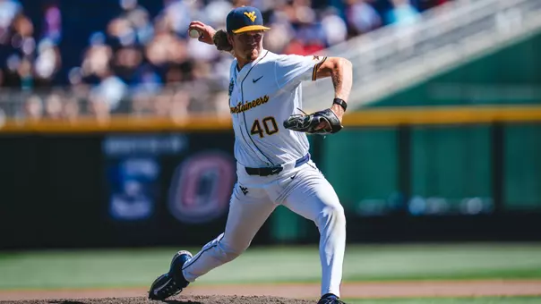 Carson Estridge throws a pitch against North Carolina in the College World Series