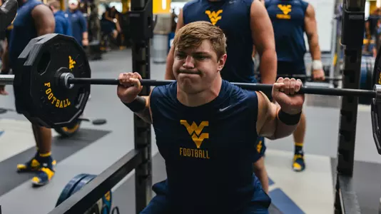 West Virginia junior offensive lineman Nick Krahe working out during the summertime at Milan Puskar Stadium.