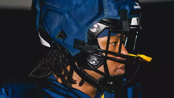 Junior defensive lineman Nate Gabriel takes a break during a fall training camp practice inside West Virginia's Caperton Indoor Practice Facility in Morgantown, West Virginia.
