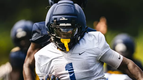 West Virginia freshman running back Amari Latimer takes part in a drill during preseason training camp on the Steve Antoline Family Practice Facility in Morgantown, West Virginia.