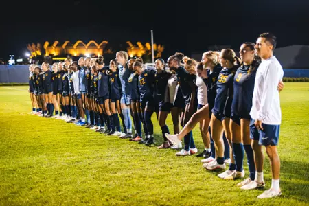 The WVU women's soccer team celebrates a win over Penn State Thursday night.