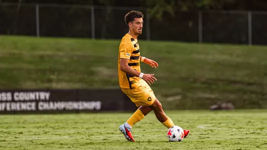 Aurelien Cormier dribbles the ball against Charlotte