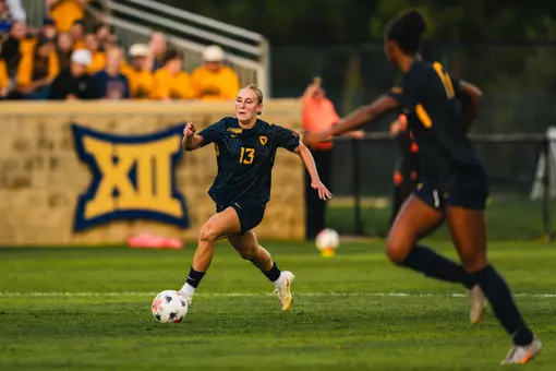 Anna Hauer of the WVU women's soccer team dribbles down the field during a match on Aug. 20.