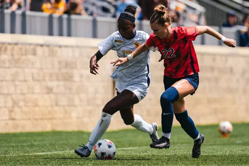 Tyler Clyburn battles for a ball during a match against Duquesne on Aug. 23.