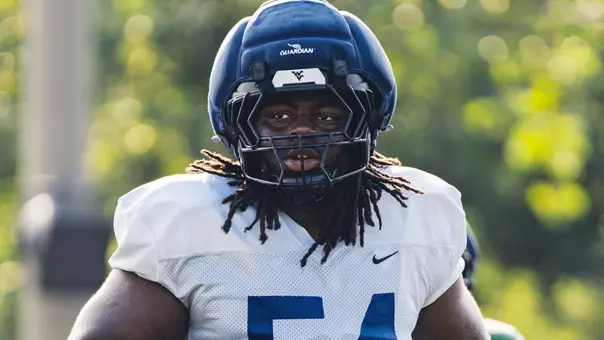 West Virginia junior offensive lineman Amare "Bubba" Grayson takes part in a preseason practice on the Steve Antoline Family Practice Facility in Morgantown, West Virginia.