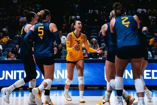 The team celebrates after a point versus UTRGV