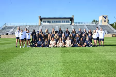 The WVU women's soccer team poses for a team photo on July 23, 2026 at Dick Dlesk Soccer Stadium.
